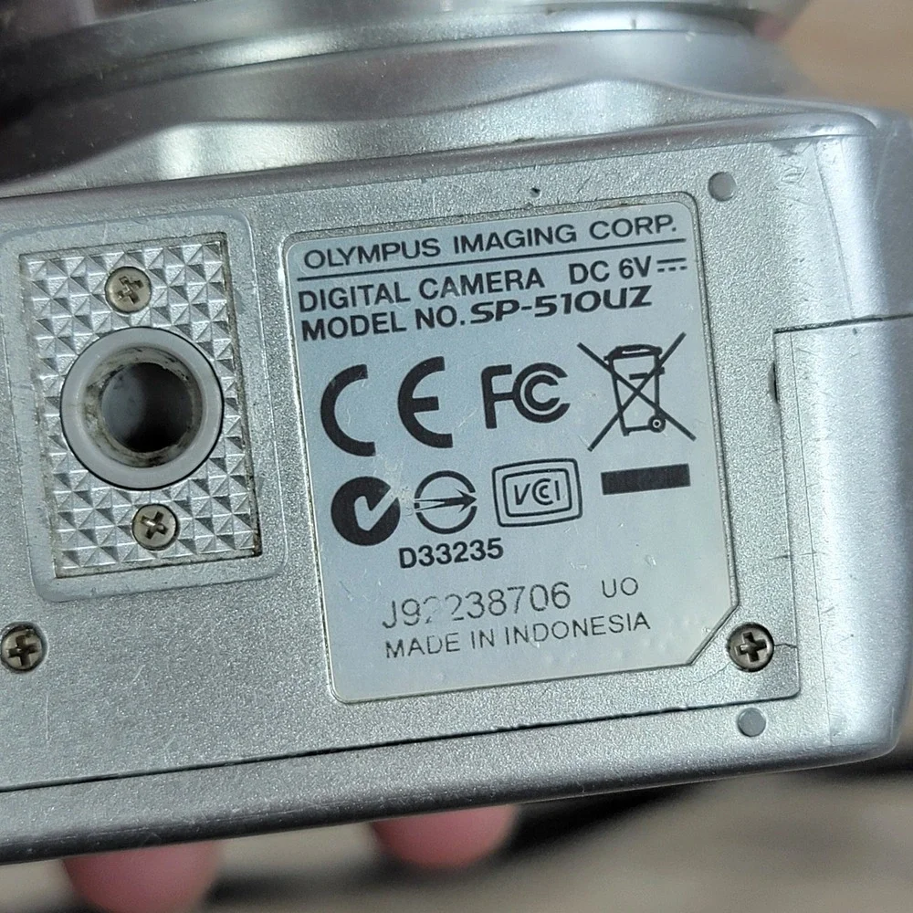 Olympus SP-510UZ 7.1 Megapixel Digital Camera 10x Optical Zoom Silver No Cap